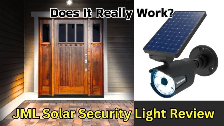 A JML solar security light mounted on a brick wall at night, illuminating a dark pathway